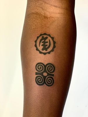 Explore the depths of symbolism with this stunning illustrative tattoo on dark skin by Epic Tattoos Guildford.