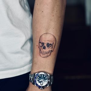 Experience stunning dotwork skull tattoo by Tal, blending illustrative style with intricate detailing for a truly unique design.