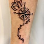 Compass and flower