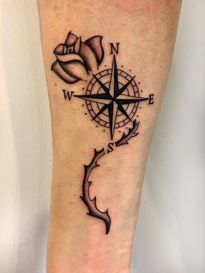Compass and flower