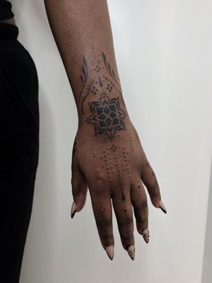 Ornamental hand tattoo by Tahsena Alam