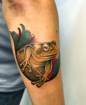 Hop into whimsical fantasy with this illustrative frog tattoo by Ben Prescott, merging old-school charm with a modern twist.