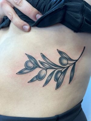 Beautiful black and gray olive branch tattoo by Ben Prescott, capturing the intricate details of nature.