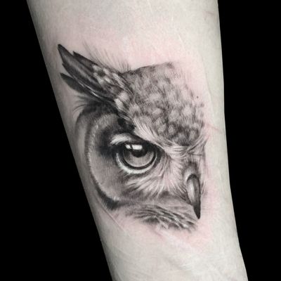 Get amazed by the intricate details and shading of this black and gray owl tattoo, expertly done by Pete Bienge.