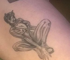 Catwoman. Left upper inner thigh