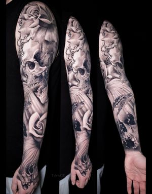Healed. Skulls and roses full sleeve tattoo. Black and grey realistic