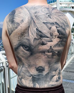 Fall themed back piece including a fox and maple leaves. Black and grey realism.