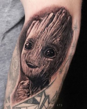 Baby groot. Mini black and grey realism tattoo.