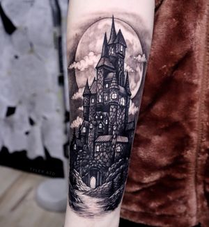 Black and grey creepy castle tattoo. Realistic gothic style