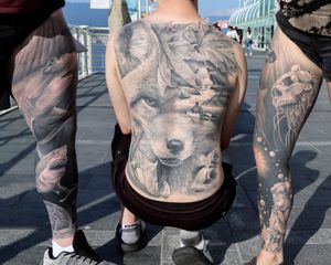 Three piece sleeves and full back. Completely healed. Large scale black and grey realism. 