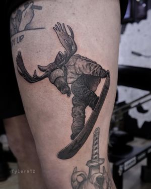 Bad ass moose tweaking a tail grab. From my flash. Black and grey tattoo.