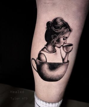 Tea cup girl in small black and grey tattoo.