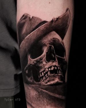 Realism cowboy skull tattoo in black and grey