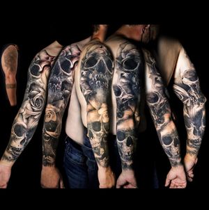 Skulls and roses full sleeve. Cover up. Black and grey realism