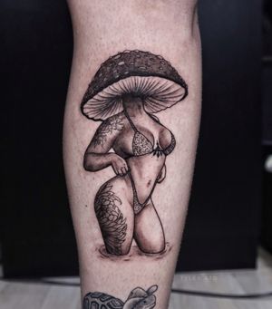 Mushroom head girl in black and grey. Semi- realistic tattoo