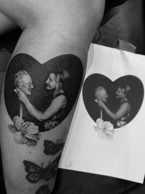 Capture your loved ones with exquisite detail in this black and gray portrait by Saka Tattoo.