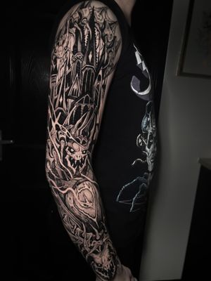 Experience the enchantment of a blackwork castle tattoo by Kike Krebs. Perfect blend of mystique and intricate design.
