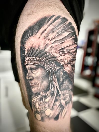 Gaston Gromnicki's stunning black & gray realism tattoo featuring a native motif. This tattoo is a true work of art.