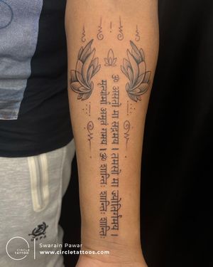 Lotus and Mantra tattoo done by Swarain Pawar 