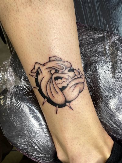 Capture the strength and loyalty of a bulldog with this beautifully detailed illustrative tattoo by artist Charlie Macarthur.