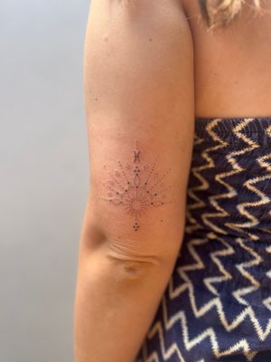 Get a stunning tattoo by Indigo Forever Tattoos, featuring intricate dotwork and ornamental designs done by hand poke technique.
