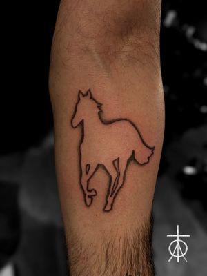 White Pony Logo, Deftones Tattoo by Claudia Fedorovici, Tattoo Artist in Amsterdam at Tempest Tattoo Studio #deftones #whitepony #logotattoo #claudiafedorovici #tattooartistsamsterdam #tempesttattoostudio