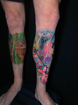 Experience the surreal combination of a rat and chameleon in this stunning realism tattoo by Marie Terry.