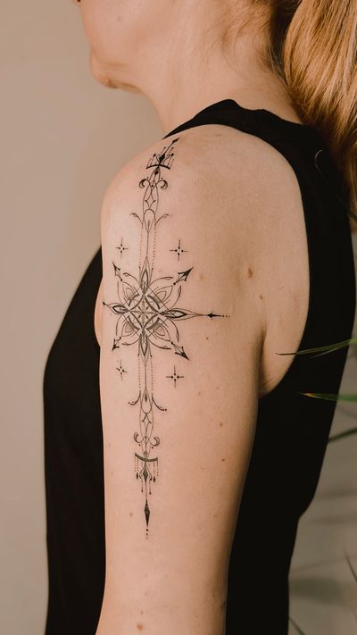 vertical ornament on the arm, fine line ornamental tattoo 