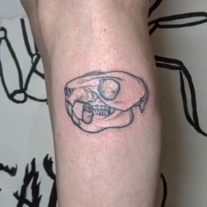 Unleash your inner darkness with a unique skull tattoo by Alien Ink, expert in blackwork, dotwork, and hand poke styles.