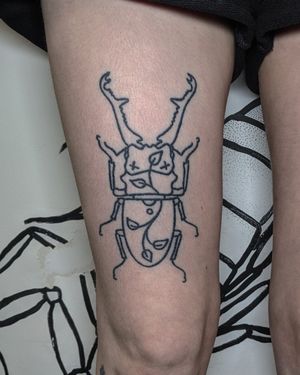 Get a stunning illustrative beetle tattoo by the talented artists at Alien Ink. Perfect for nature lovers and insect enthusiasts.