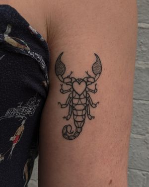 Get inked with a stunning illustrative scorpion design by the talented artists at Alien Ink. Stand out from the crowd with this unique piece!