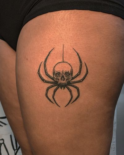 Alien Ink's illustrative blackwork spider tattoo, created with intricate dotwork and hand poked technique.