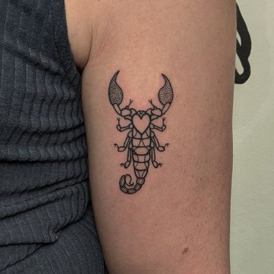 Get inked with a unique dotwork scorpion design by the talented artists at Alien Ink. A stunning illustrative piece for your body art collection.