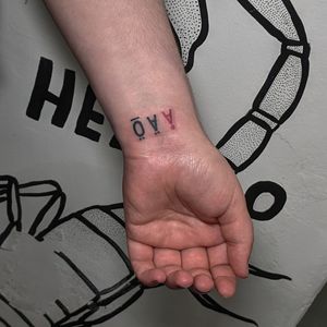Get a unique and stylish lettering tattoo by the talented artists at Alien Ink. Express yourself with personalized text that speaks to your personality.