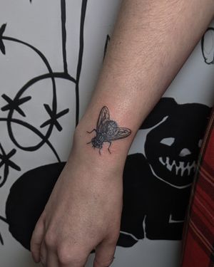 Embrace the beauty of blackwork with this illustrative fly tattoo, expertly crafted by Alien Ink.