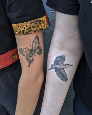 Experience the ethereal beauty of this hand-poked blackwork butterfly tattoo, expertly crafted by Alien Ink.