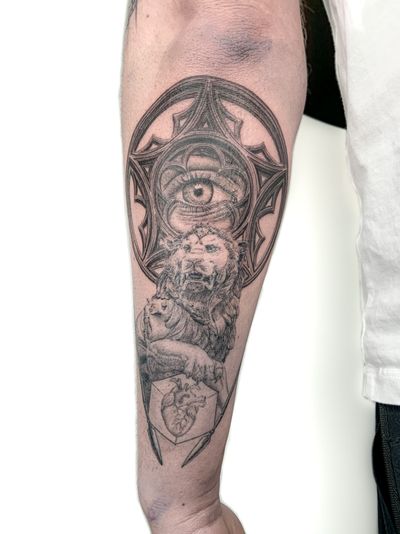 Black and grey realism of lion statue holding heart with cathedral window in the background with a realistic eye looking through.