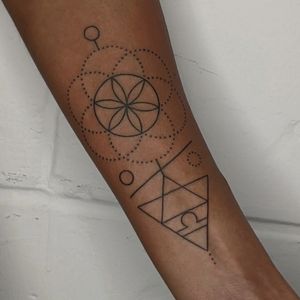 Discover the beauty of fine line geometric art with this abstract tattoo designed by Alien Ink. Get inked with a unique, modern masterpiece.