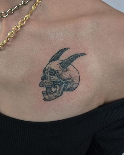 Get a unique hand-poked illustrative skull tattoo from Alien Ink, expert in dotwork designs. Stand out with this intricate artwork!