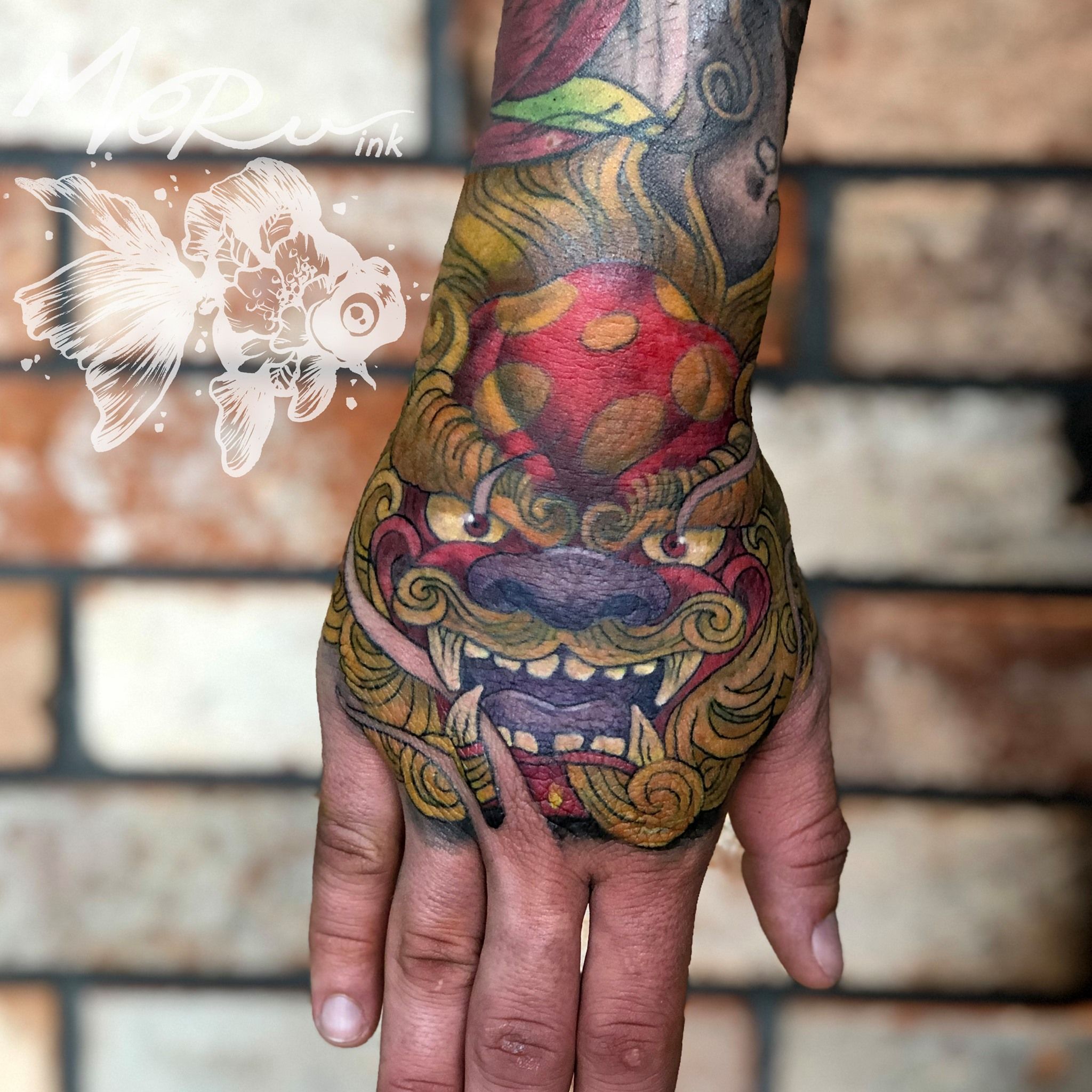 Red and orange Okinawa shisa dogs pair. One with mouth open, one with mouth  closed. chest piece tattoo idea | TattoosAI