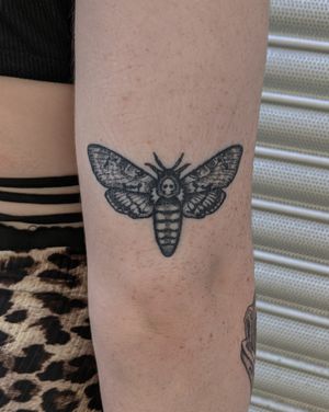 Experience Alien Ink's unique style in this mesmerizing moth design. Hand-poked with intricate dotwork details.