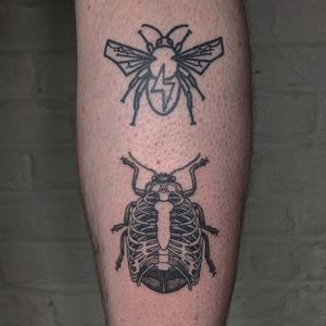 Get a unique blackwork ladybug tattoo done by the talented artists at Alien Ink studio. The intricate design will surely make a statement!