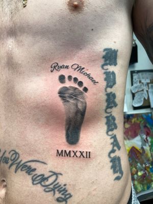 Rib Tattoo #babyfootprint #blackandgray #realistic #tattooideas #ronnyeast