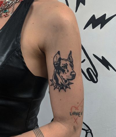 Get a striking blackwork dog tattoo with a detailed Doberman design by the talented artists at Alien Ink. Perfect for dog lovers!