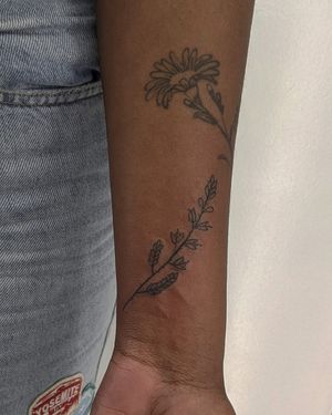 Unique dotwork & hand-poke design by Alien Ink, featuring a delicate sprig and winding vine branch motif.