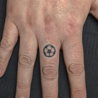 Elevate your love for the game with this mesmerizing blackwork football design by Alien Ink. Perfect for sports enthusiasts!