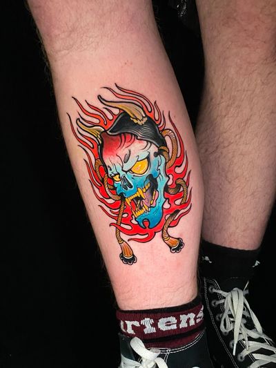 Embrace the fusion of traditional and modern art with this stunning lower leg tattoo by renowned artist Jethro Wood.