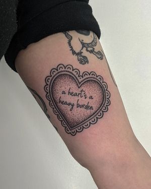 Get a unique dotwork and illustrative heart tattoo done by Alien Ink for a contemporary and artistic look.