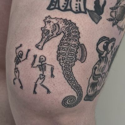 Get a unique illustrative seahorse tattoo by the talented artists at Alien Ink. Stand out with this beautiful ocean-inspired design!