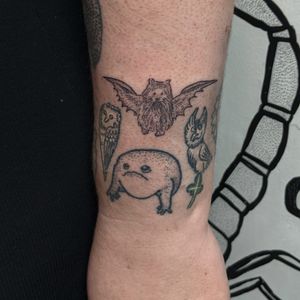 Experience a unique blend of dotwork and handpoke techniques with an illustrative patchwork design by Alien Ink.